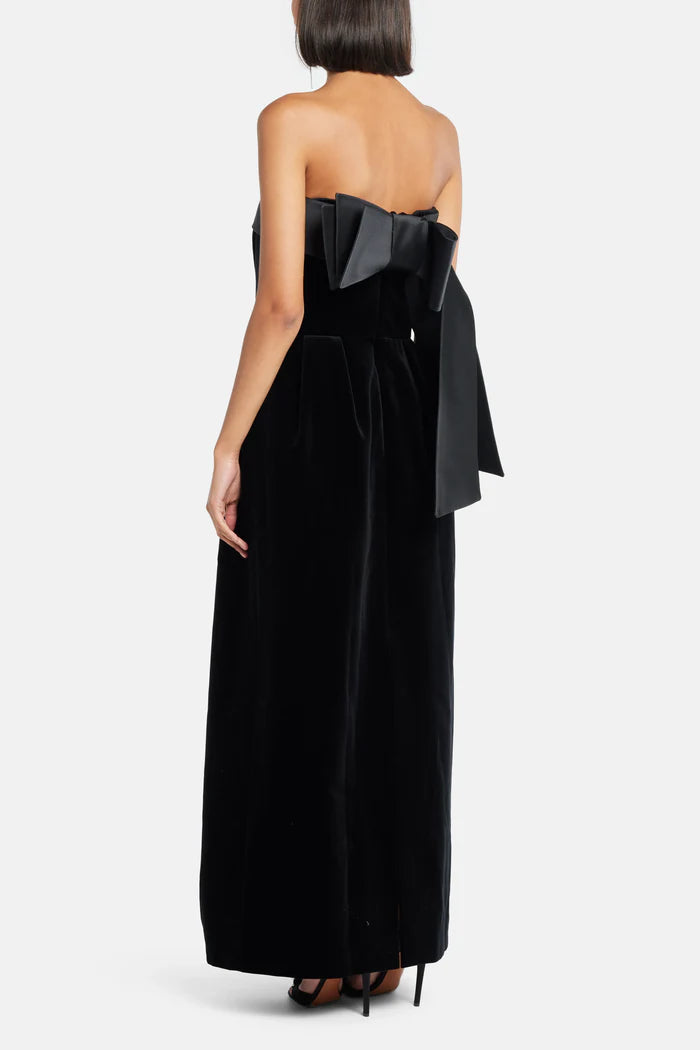 Black velvet strapless gown with satin trim and silver clutch — Dice Kayek | Endless UAE