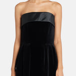 Black velvet strapless gown with satin trim and silver clutch — Dice Kayek | Endless UAE