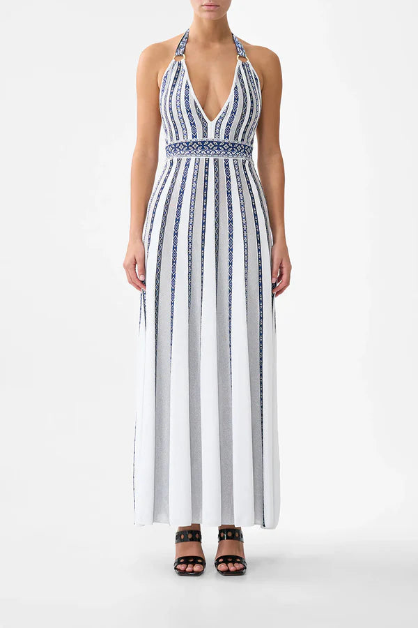 Woman wearing striped halter neck sleeveless knit maxi dress with navy and white vertical stripes — Camilla | Endless UAE