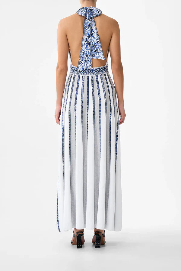 Woman wearing striped halter neck sleeveless knit maxi dress with navy and white vertical stripes — Camilla | Endless UAE