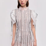 Clara Maxi Dress in white with pleated bodice and puff sleeves — Aje | Endless UAE