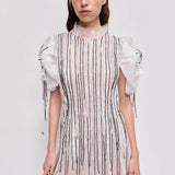 Clara Maxi Dress in white with pleated bodice and puff sleeves — Aje | Endless UAE