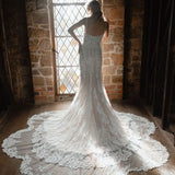 Rita mermaid wedding dress with intricate lace detailing and train — You&I | Endless UAE