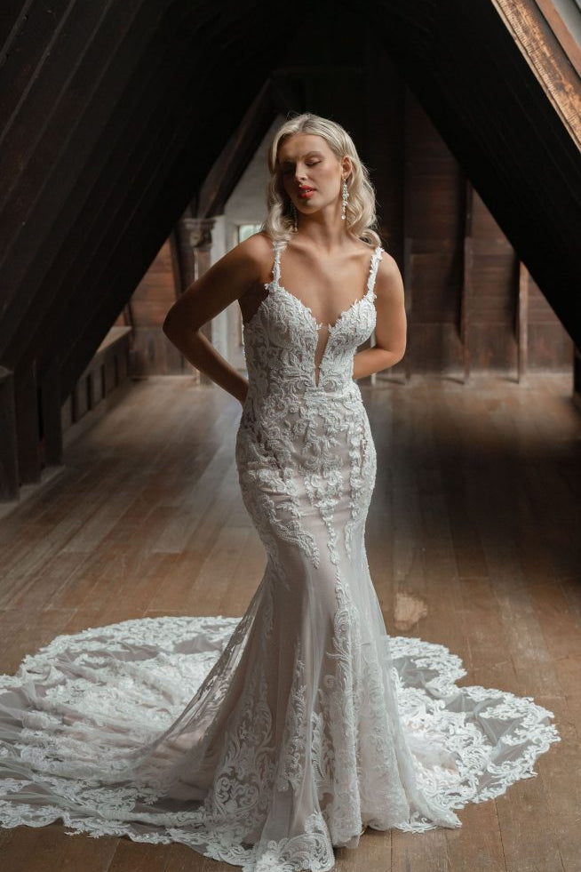 Rita mermaid wedding dress with intricate lace detailing and train — You&I | Endless UAE