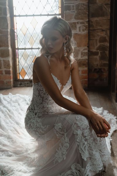 Rita mermaid wedding dress with intricate lace detailing and train — You&I | Endless UAE
