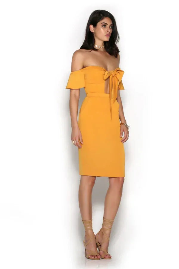 Golden yellow off-shoulder midi dress with bow detail — Runaway The Label | Endless UAE