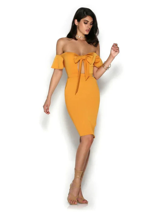Golden yellow off-shoulder midi dress with bow detail — Runaway The Label | Endless UAE