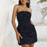 Black strapless mini dress with textured rose appliqué detail and fitted silhouette — Runaway The Label | Endless UAE