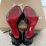 Black leather peep-toe platform pumps with bow detail and lace-up ankle straps — Christian Louboutin | Endless UAE