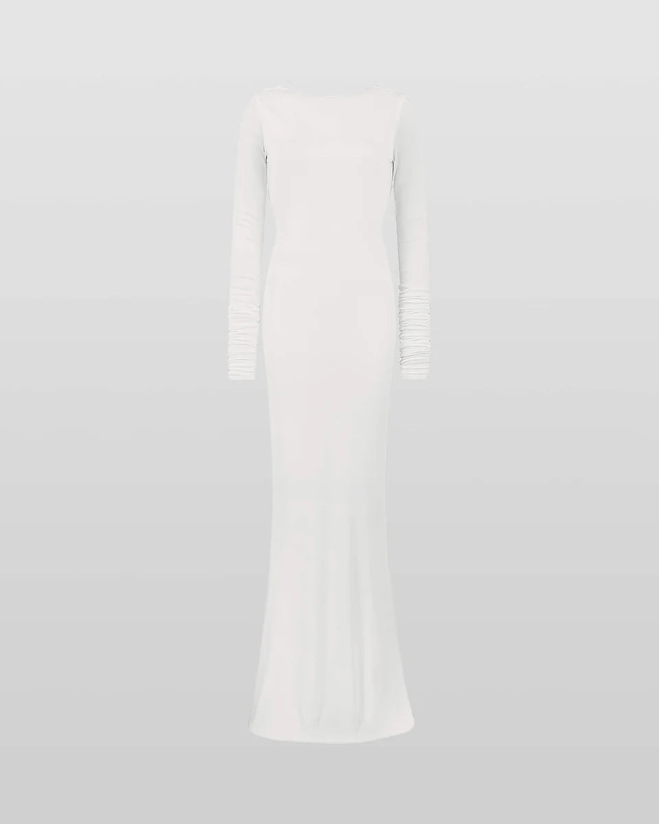 Woman wearing a cream long-sleeved fitted maxi dress with a crew neckline — Rat & Boa | Endless UAE