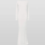 Woman wearing a cream long-sleeved fitted maxi dress with a crew neckline — Rat & Boa | Endless UAE