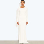 Woman wearing a cream long-sleeved fitted maxi dress with a crew neckline — Rat & Boa | Endless UAE