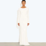 Woman wearing a cream long-sleeved fitted maxi dress with a crew neckline — Rat & Boa | Endless UAE