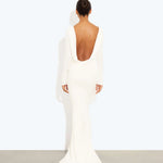 Woman wearing a cream long-sleeved fitted maxi dress with a crew neckline — Rat & Boa | Endless UAE
