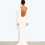 Woman wearing a cream long-sleeved fitted maxi dress with a crew neckline — Rat & Boa | Endless UAE