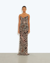 Woman wearing black and cream zebra stripe maxi dress with cowl neckline — Endless | Endless UAE