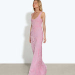 Woman wearing pink sleeveless maxi dress standing between dried palm fronds — Rat & Boa | Endless UAE