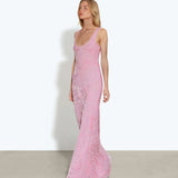 Woman wearing pink sleeveless maxi dress standing between dried palm fronds — Rat & Boa | Endless UAE