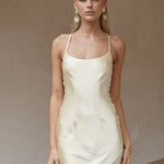 Cream satin maxi dress with thin straps and asymmetrical hem — Runaway The Label | Endless UAE
