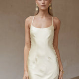 Cream satin maxi dress with thin straps and asymmetrical hem — Runaway The Label | Endless UAE