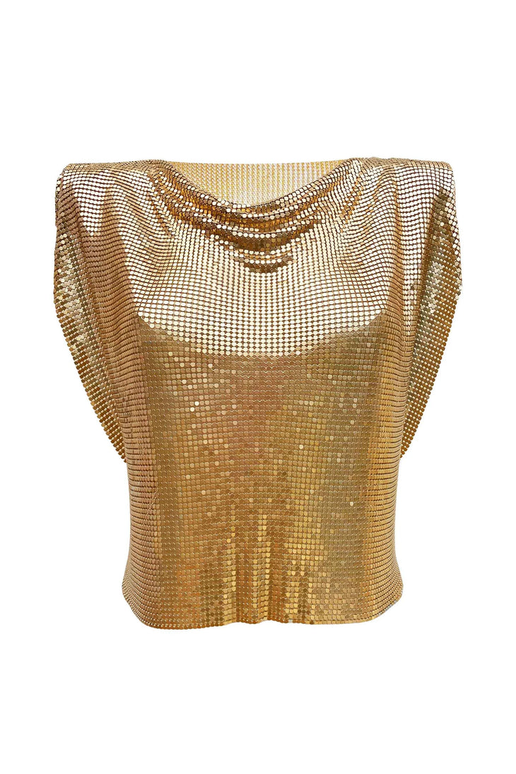 Gold Mesh Sleeveless Top worn with black pants at sunset — Isabel Moore | Endless UAE