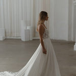 Somerset wedding dress by Madi Lane, ivory A-line gown with beaded bodice and flowing skirt — Madi Lane | Endless UAE