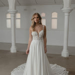 Somerset wedding dress by Madi Lane, ivory A-line gown with beaded bodice and flowing skirt — Madi Lane | Endless UAE