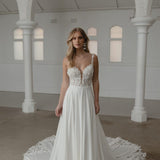 Somerset wedding dress by Madi Lane, ivory A-line gown with beaded bodice and flowing skirt — Madi Lane | Endless UAE
