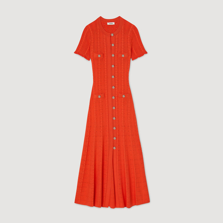 Vibrant orange knit maxi dress with short sleeves, button-front closure, decorative pockets, and textured ribbed pattern — Sandro | Endless UAE