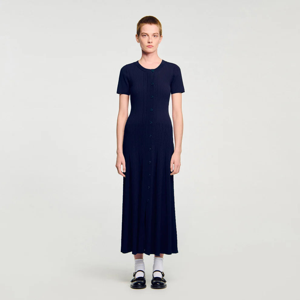 Woman wearing navy ribbed knit maxi dress with short sleeves and button front — Endless | Endless UAE