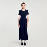 Woman wearing navy ribbed knit maxi dress with short sleeves and button front — Endless | Endless UAE