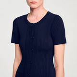 Woman wearing navy ribbed knit maxi dress with short sleeves and button front — Endless | Endless UAE