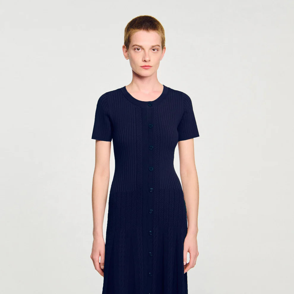 Woman wearing navy ribbed knit maxi dress with short sleeves and button front — Endless | Endless UAE