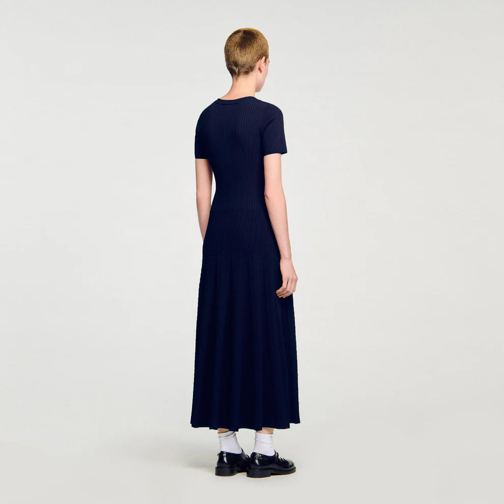 Woman wearing navy ribbed knit maxi dress with short sleeves and button front — Endless | Endless UAE