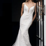 Bride in white lace mermaid gown with dramatic train at balcony — JESSICA COUTURE | Endless UAE