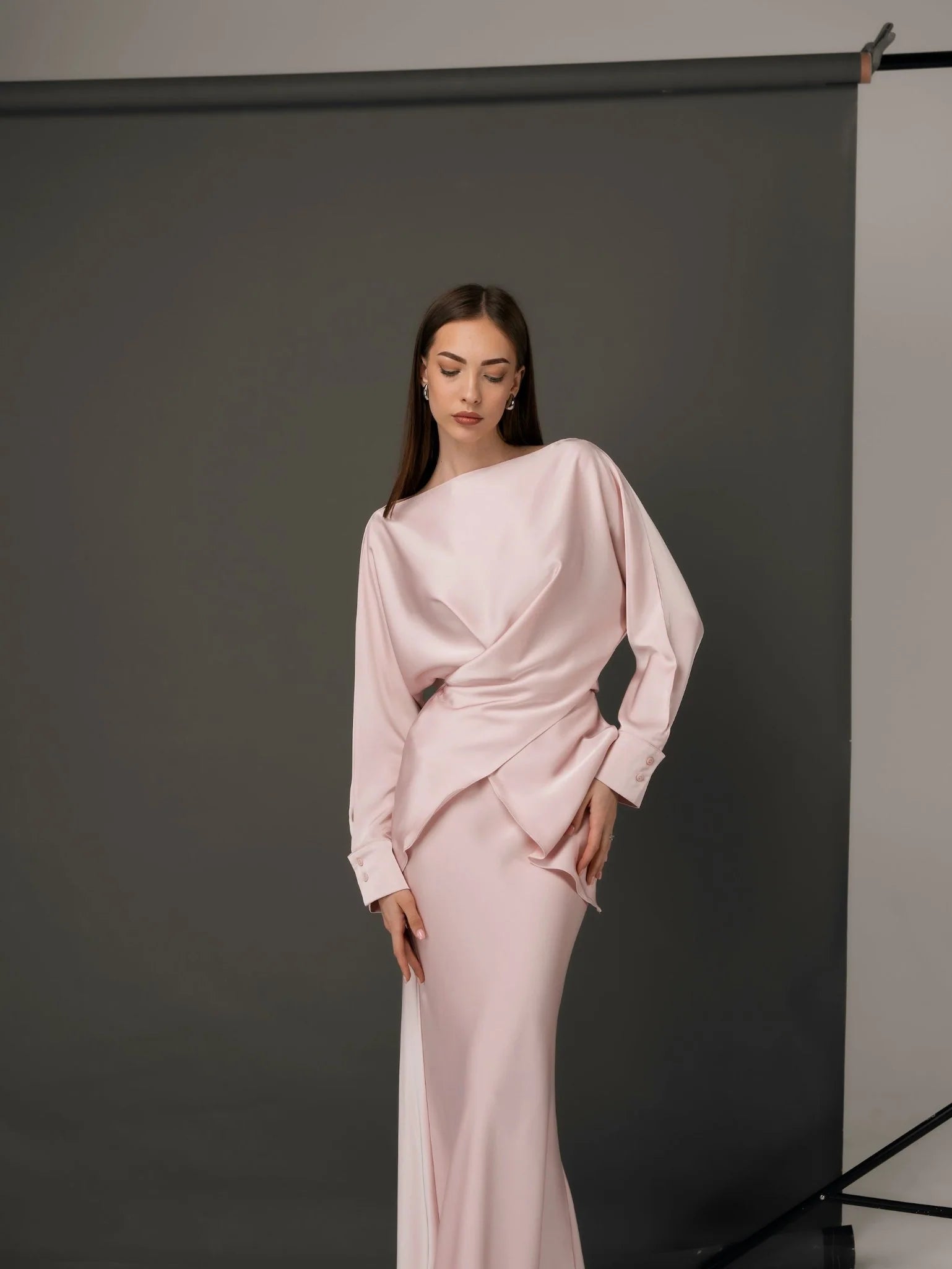 Elegant pale pink satin co-ord set with draped long sleeve top and fitted maxi skirt — Nora The Label | Endless UAE