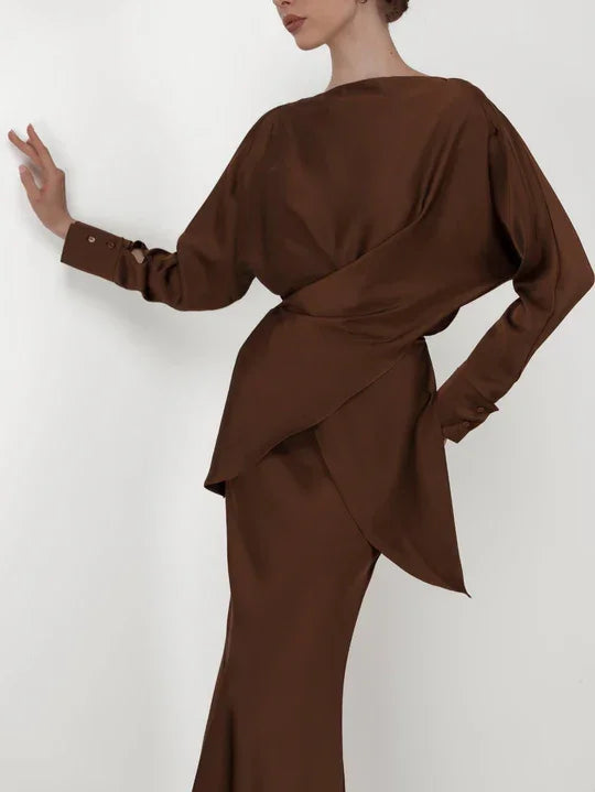Woman wearing brown Tessa Co-ord Set with draped wrap detailing and long sleeves — Nora The Label | Endless UAE