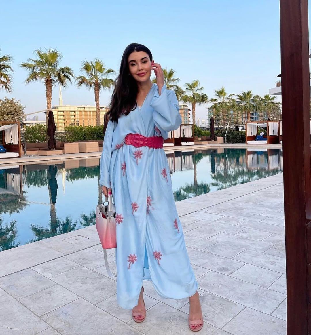 Blue floral abaya with red embroidery and belt — Sanah Yasin | Endless UAE