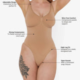 Beige thong bodysuit with adjustable straps and compression panels — Underhance | Endless UAE