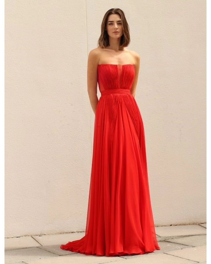 Red strapless evening gown with pleated bodice and flowing skirt — Bots© | Endless UAE