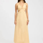 Pale yellow maxi dress with ring detail cutout at bust, sleeveless halter straps, and flowing A-line silhouette — Kookai | Endless UAE