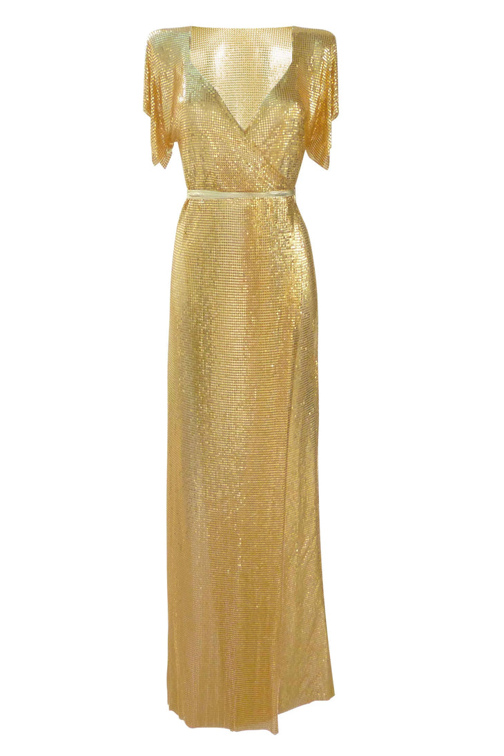 Gold sequin wrap dress on runway model at fashion show — Isabel Moore | Endless UAE