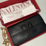 Black leather VLOGO chain wallet with gold hardware — Valentino | Endless UAE
