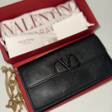 Black leather VLOGO chain wallet with gold hardware — Valentino | Endless UAE