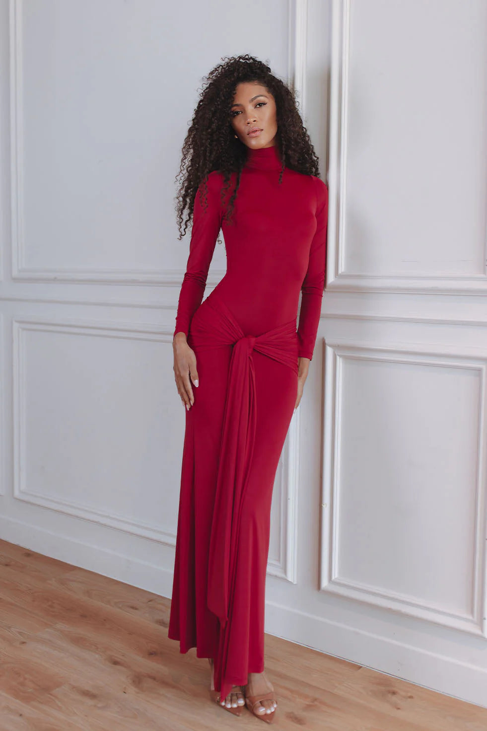 Elegant red maxi dress with turtleneck, long sleeves and statement tie detail at waist — Chic Le Frique | Endless UAE