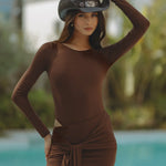 Woman wearing brown long-sleeve cut-out mini dress with cowboy hat by water — Chic Le Frique | Endless UAE