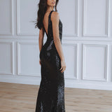 Elegant black sequin maxi dress with deep back, floor-length silhouette, perfect for evening events — Chic Le Frique | Endless UAE