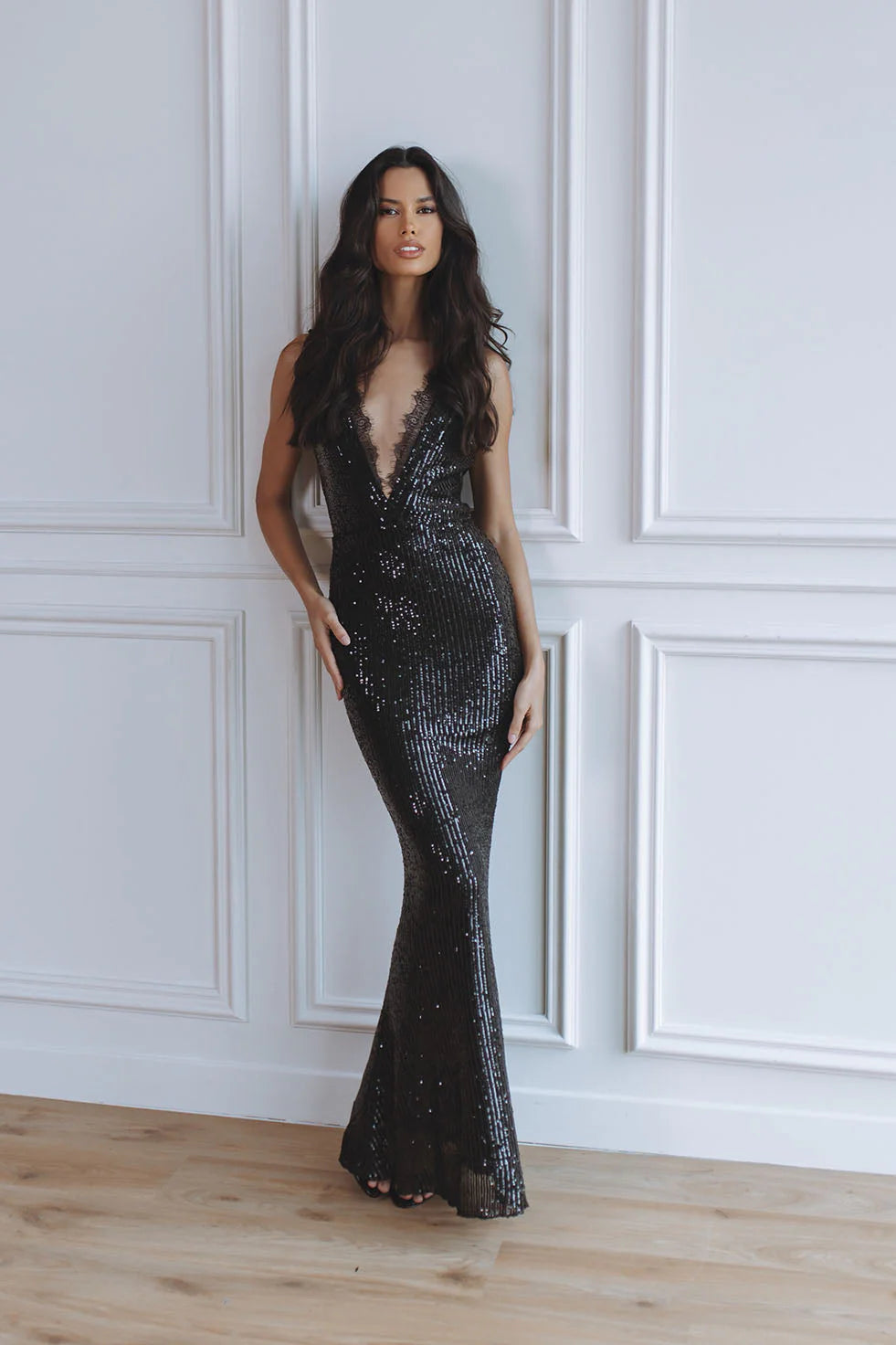 Elegant black sequin maxi dress with deep V-neckline and lace trim detail, floor-length silhouette — Chic Le Frique | Endless UAE