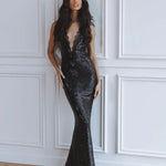 Elegant black sequin maxi dress with deep V-neckline and lace trim detail, floor-length silhouette — Chic Le Frique | Endless UAE