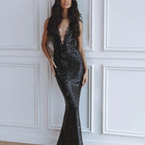 Elegant black sequin maxi dress with deep V-neckline and lace trim detail, floor-length silhouette — Chic Le Frique | Endless UAE